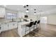 Modern white kitchen with island and stainless steel appliances at 2900 Richfield Blvd, Las Vegas, NV 89102