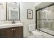 Clean bathroom with a bathtub, shower, and modern vanity at 4761 Lake Pl, Las Vegas, NV 89147