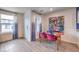 Modern dining area with wooden table and velvet chairs at 4836 Currant Ridge Ave # 70, Las Vegas, NV 89141