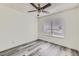 Bedroom with gray vinyl flooring and ceiling fan at 4839 W Montara Cir, Las Vegas, NV 89121