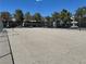 Community tennis court with surrounding fence and building views at 5243 Corinne Ct # 67, Las Vegas, NV 89103