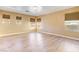 Spacious bedroom with hardwood floors and multiple windows at 6608 Wind Whisper St, Las Vegas, NV 89148