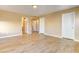 Bright hallway with hardwood floors and access to bedrooms at 6608 Wind Whisper St, Las Vegas, NV 89148