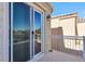 Private balcony with sliding glass door and view at 7445 Vernal St, Las Vegas, NV 89139