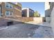 Backyard patio with gravel, grill, and block wall at 805 N Water St, Henderson, NV 89015