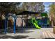 playground with shade structure and play equipment at 11 Carolina Cherry Dr, Las Vegas, NV 89141