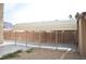 Backyard with metal carport structure at 1373 Blazing Sand St, Las Vegas, NV 89110