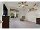 Bedroom with a ceiling fan and whimsical wall art at 1413 October Oak Ave, Las Vegas, NV 89123