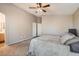 Serene bedroom with ceiling fan and neutral decor at 1628 Clint Canyon Dr, Henderson, NV 89002