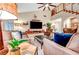 Close-up of the living room with a focus on the entertainment center and comfortable seating at 193 Webster Way, Henderson, NV 89074