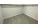 Large walk-in closet with gray vinyl flooring at 2208 Alisa Maria Way, Las Vegas, NV 89104