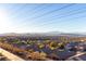 Aerial view of a residential neighborhood with mountain views at 2456 Rue Bienville Way, Henderson, NV 89044