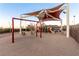 Playground with swings and shade structure at 2456 Rue Bienville Way, Henderson, NV 89044