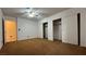 Large bedroom with double closets and carpet at 3119 Desmond Ave, Las Vegas, NV 89121