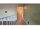 Clean hallway with light colored walls and tiled floors at 3119 Desmond Ave, Las Vegas, NV 89121