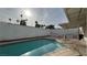 Inviting swimming pool with surrounding patio and wall at 3119 Desmond Ave, Las Vegas, NV 89121