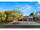 Modern home with two-car garage and landscaped yard at 33 Owl Ridge Ct, Las Vegas, NV 89135