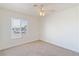 Bright bedroom with neutral walls and carpet flooring at 412 Vassar Ln, Las Vegas, NV 89107