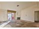 Bright living room with fireplace and patio access at 4730 E Craig Rd # 2110, Las Vegas, NV 89115