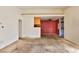 Open living area with kitchen and access to laundry at 4730 E Craig Rd # 2110, Las Vegas, NV 89115