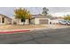 House exterior, including garage and driveway, with a view of the street at 523 Coolidge Ave, Henderson, NV 89015