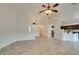 Bright living room features tile floors and a view into the kitchen and dining area at 523 Coolidge Ave, Henderson, NV 89015