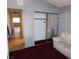 Bedroom with closet, sofa and view of hallway at 6125 Blossom Knoll Ave, Las Vegas, NV 89108