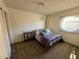 Bedroom with a double bed and wall decor at 110 Bel Port Dr # 113, Las Vegas, NV 89110