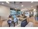 Open concept living room showcasing a stylish interior and connection to the kitchen at 12013 Glentana View St, Las Vegas, NV 89138