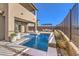 Modern backyard pool with a pergola and plenty of space for lounging at 12013 Glentana View St, Las Vegas, NV 89138