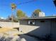 Backyard view of home with storage shed and palm tree at 1812 Ryan Ave, Las Vegas, NV 89101