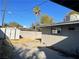 Backyard view of home with storage shed and palm tree at 1812 Ryan Ave, Las Vegas, NV 89101