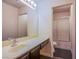 Bathroom with sink, vanity, and shower/tub combo at 227 Palmarosa St, Henderson, NV 89015