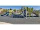 Modern playground with slides, climbing structures, and soft surface at 2843 Kona Blue Ln # 5, Las Vegas, NV 89183