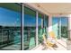 Private balcony with sliding glass doors and outdoor seating at 322 Karen Ave # 505, Las Vegas, NV 89109