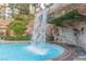 Inviting pool area featuring a serene waterfall feature at 322 Karen Ave # 505, Las Vegas, NV 89109