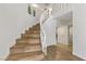 Elegant curved staircase with wood treads and white railing at 4330 Flandes St, Las Vegas, NV 89121