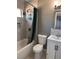 Clean bathroom with white vanity and marble accents at 4752 Livermore Ave, Las Vegas, NV 89120