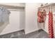 Bright walk-in closet with hanging rods and shelves at 5766 Sunset Sedona St # Lot 18, North Las Vegas, NV 89081