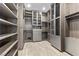 Spacious walk-in closet with ample shelving and drawers at 6160 Banded Stones Ct, Las Vegas, NV 89135