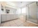 Main bathroom boasts double sinks, soaking tub, and walk-in shower at 6175 Novelty St, Las Vegas, NV 89148