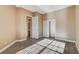 Bedroom with wood-look floors, large closet, and adjoining bathroom at 6205 Red Pine Ct, Las Vegas, NV 89130