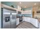 Modern kitchen with stainless steel appliances and white cabinets at 7830 Pandora Sky St # 192, Las Vegas, NV 89084