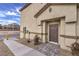 Front entrance with walkway, landscaping, and fire hydrant at 7945 Aurora Sky St # 641, North Las Vegas, NV 89084