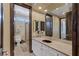 Bathroom with granite countertop and a walk-in shower at 2024 Troon Dr, Henderson, NV 89074