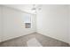 Well-lit bedroom with grey carpet and window with blinds at 5672 Sapphire Shine Ave, Las Vegas, NV 89122