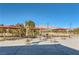 Relaxing poolside patio with shade umbrellas at 7616 Fruit Dove St, North Las Vegas, NV 89084