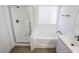 Updated bathroom featuring a shower and tub combo at 7769 Somerhill Point Way, Las Vegas, NV 89139