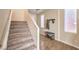 Staircase with carpet runner and coat rack at 10421 Mount Washington Ave, Las Vegas, NV 89166