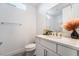 Modern bathroom with white vanity and quartz countertop at 2486 Indigo Mountain St, Henderson, NV 89044